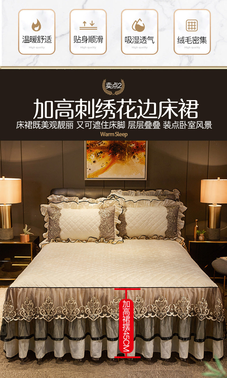 A bed featuring a decorative skirt and pillowcases for a warm sleep set.