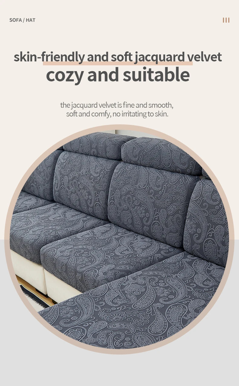 A close-up view of a dark gray jacquard velvet sofa cushion cover with an ornate pattern.