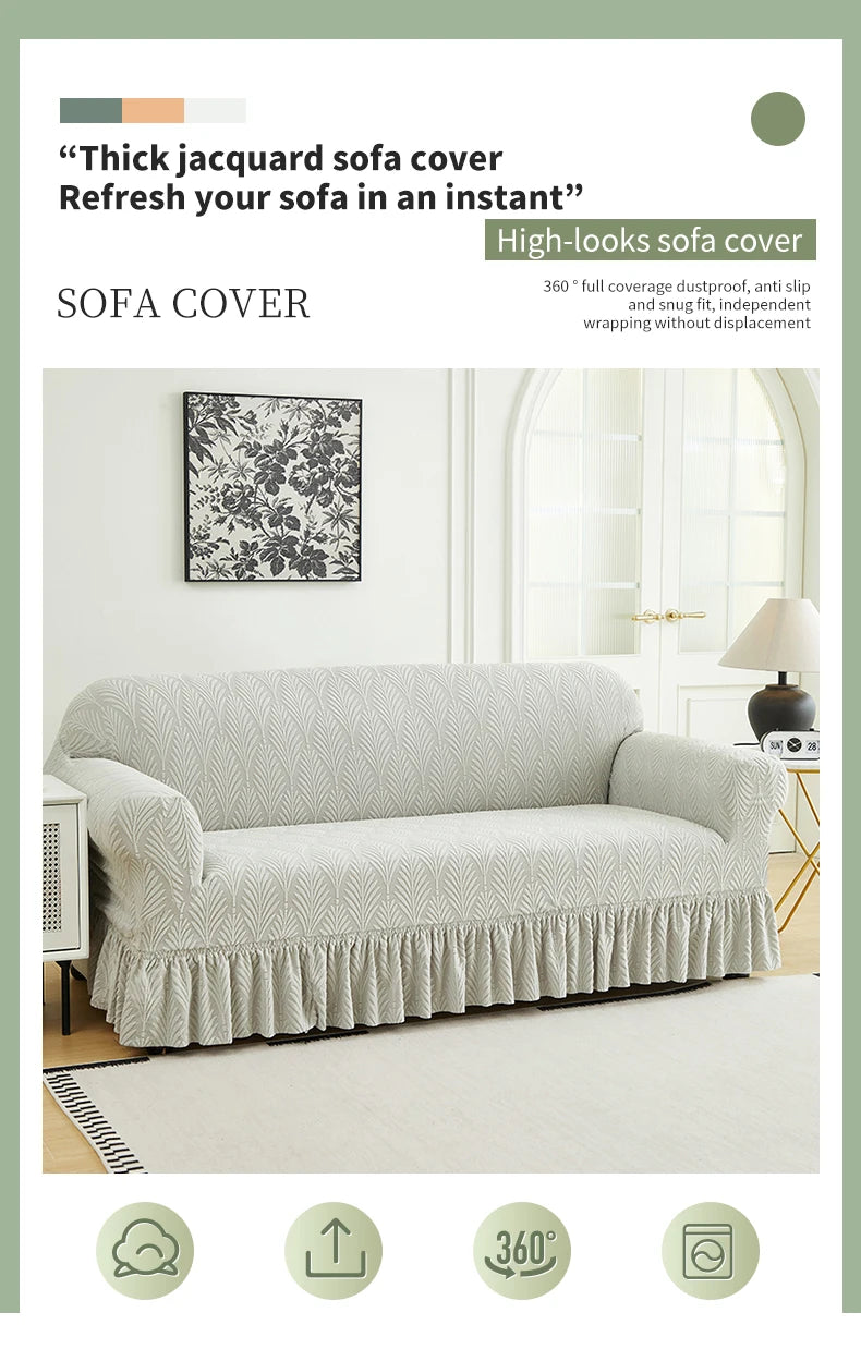 A light gray jacquard sofa cover is displayed on a sofa, showing its texture and drape.