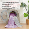A purple and gray cooling breathable blanket is shown inside a washing machine drum.
