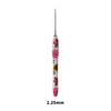 A single handmade crochet knitting hook with a colorful, floral design.