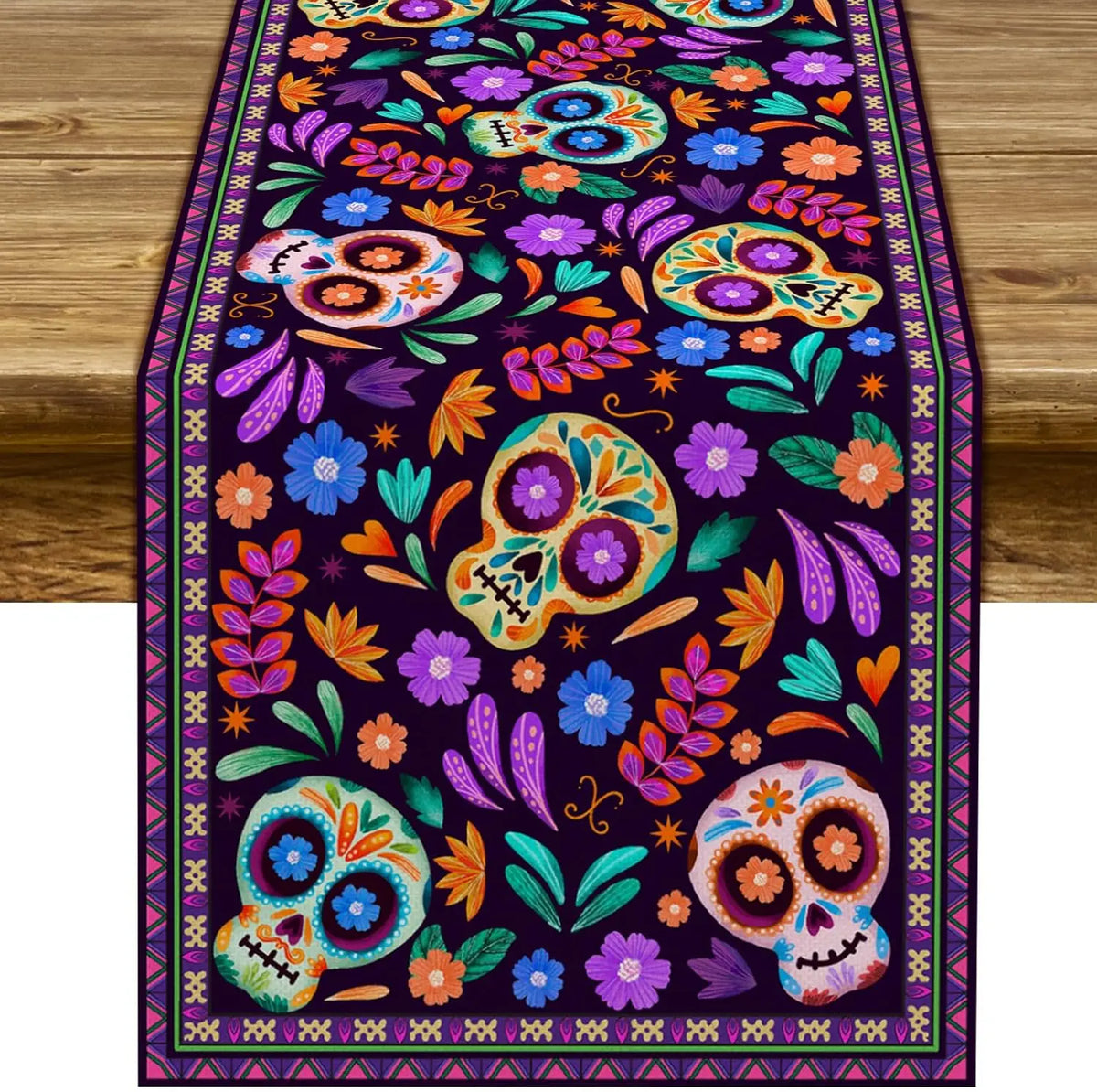 A vibrant purple and orange Day of the Dead sugar skull linen table runner featuring colorful floral patterns.