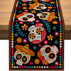 A vibrant Day of the Dead sugar skull linen table runner featuring colorful skulls and floral patterns.