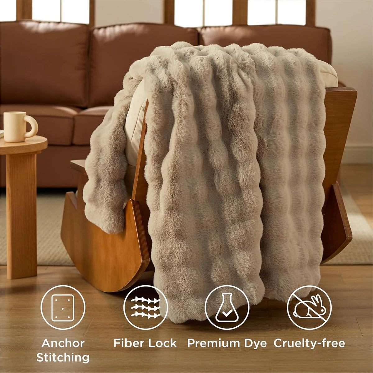 A fluffy beige faux fur blanket draped over a wooden chair, highlighting anchor stitching and premium dye features.