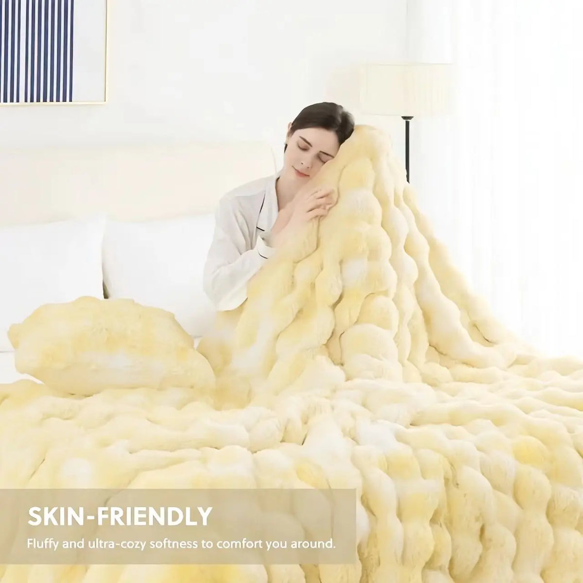 A fluffy yellow faux fur rabbit blanket is displayed on a bed, emphasizing its soft texture.
