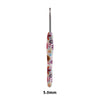 A single handmade crochet knitting hook with a silver shaft and a colorful, patterned handle.