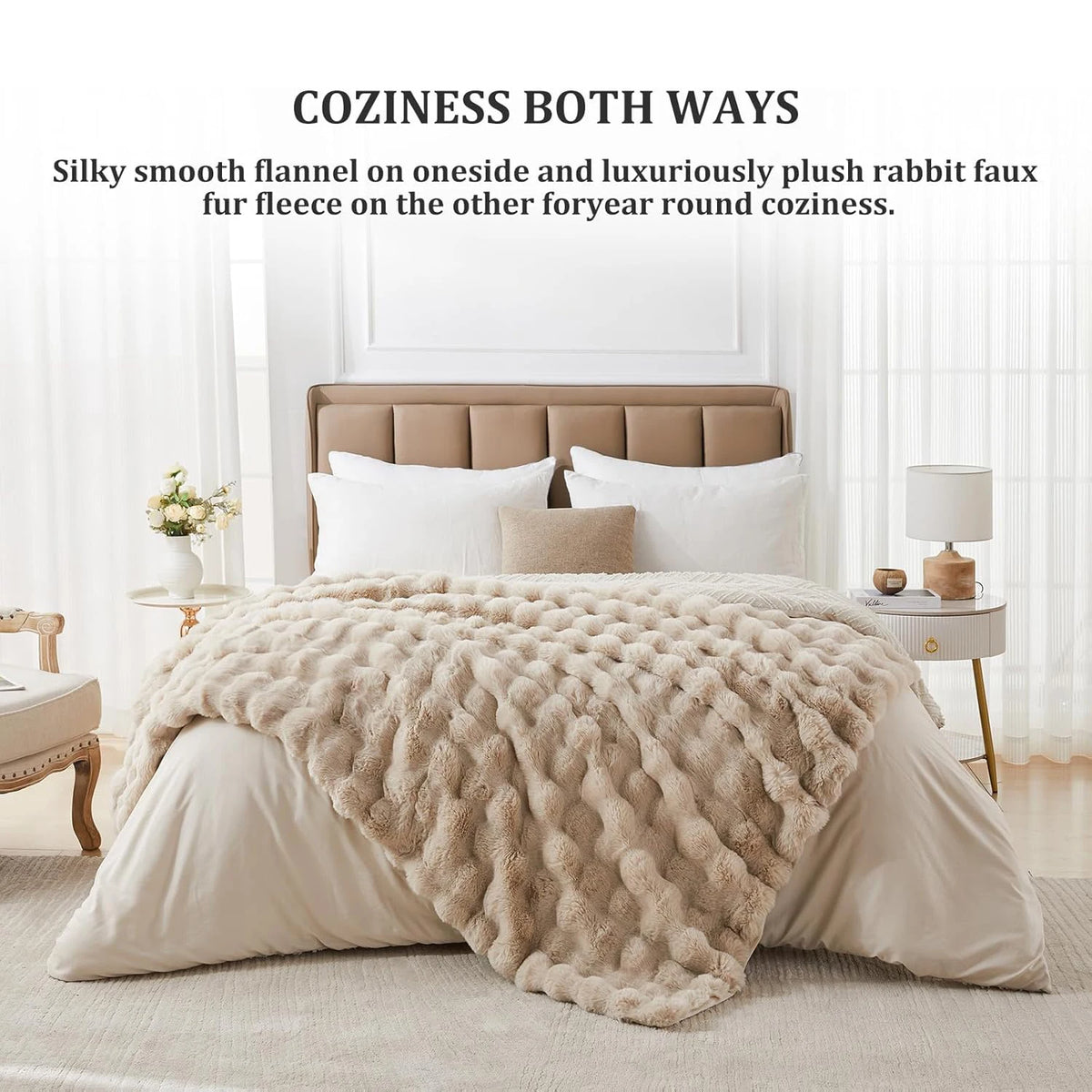 A beige faux fur blanket is draped over a bed, showcasing its silky smooth flannel and plush rabbit faux fur texture.