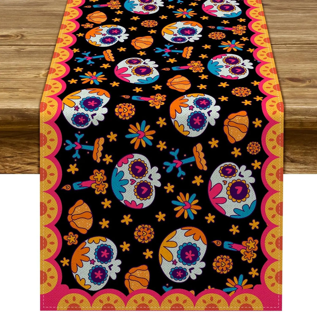 A vibrant Day of the Dead sugar skull linen table runner featuring colorful floral patterns on a black background.