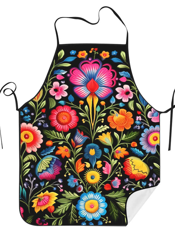 Black apron with a vibrant floral pattern featuring pink, orange, and blue flowers and leaves.