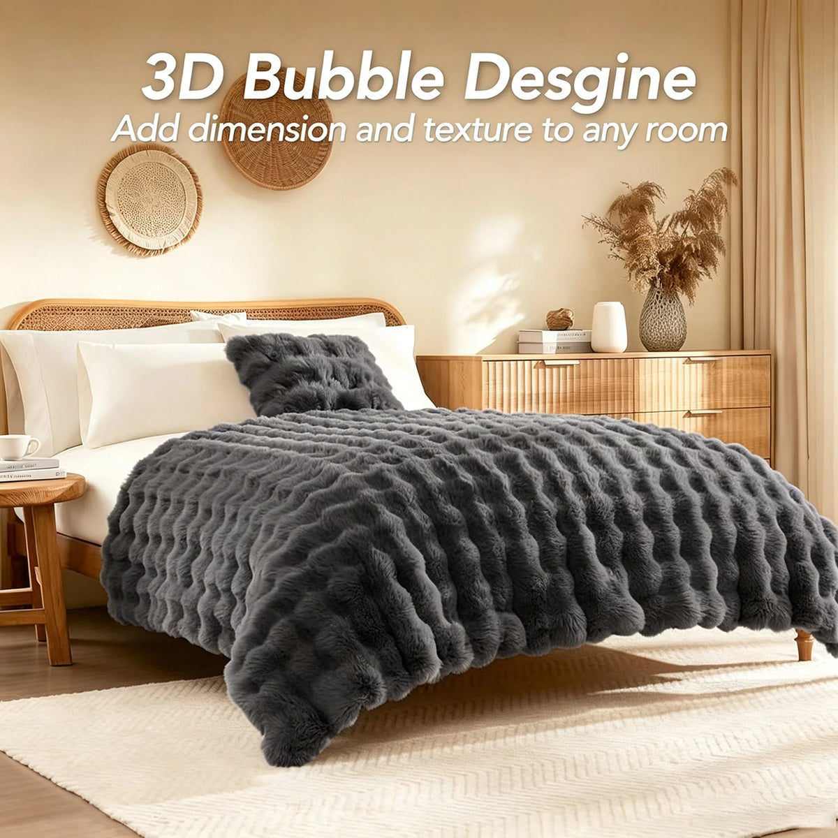 A dark gray oversized plush faux fur bubble blanket draped over a bed in a bright room.