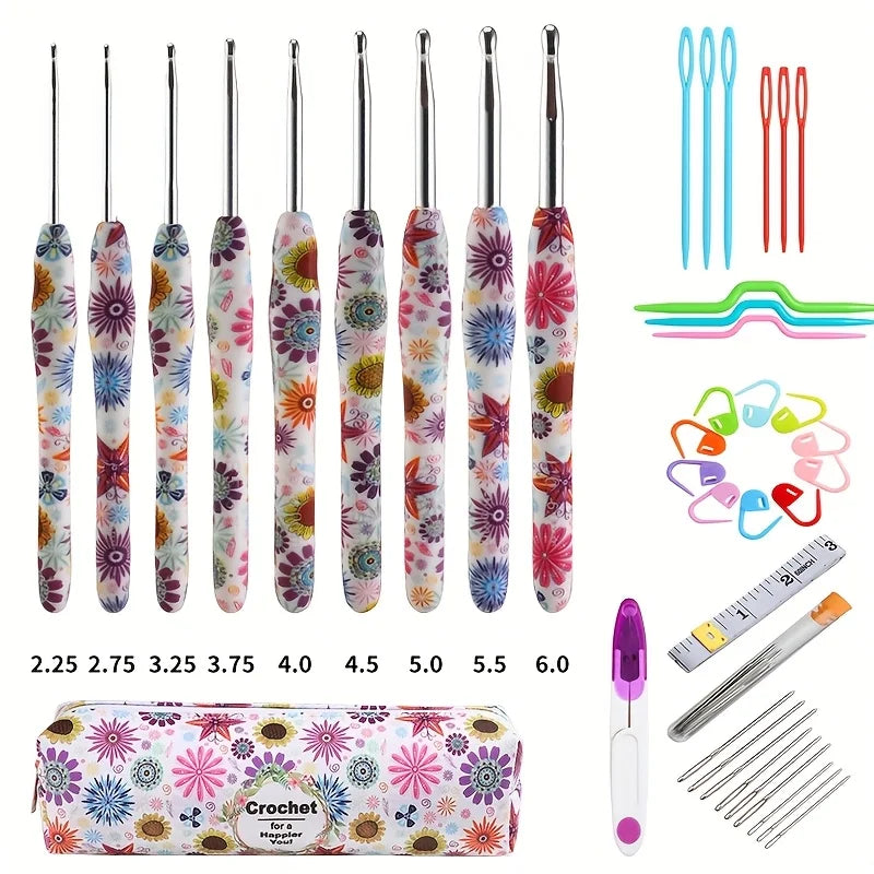 A set of various sized and shaped crochet knitting hooks in pink, green, and clear plastic.