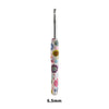 A single handmade crochet knitting hook with a floral design and a silver tip, measuring 6.5mm.