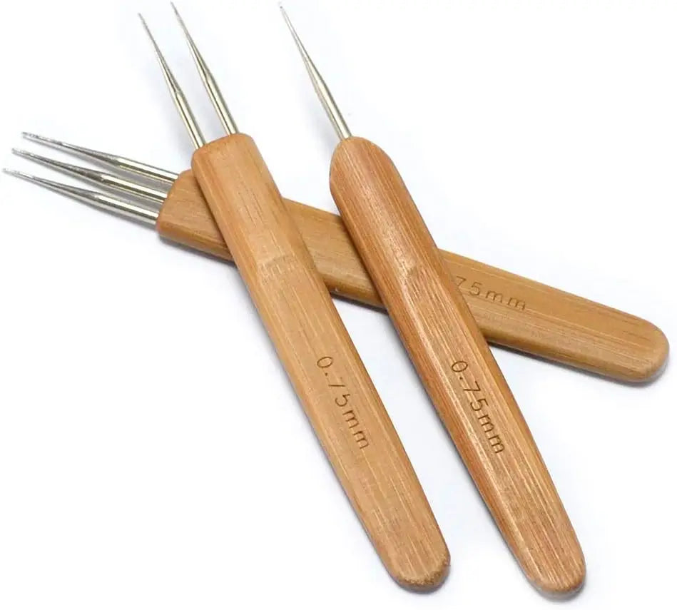 A set of wooden dreadlock crochet hooks with sharp metal tips.