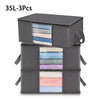 Three gray foldable clothes organizer bags with clear windows stacked together