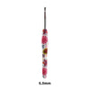 A handmade crochet knitting hook with a floral design, measuring 6.0mm.