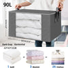 A dark gray foldable clothes organizer bag shown with a clear window displaying neatly folded white clothes and blankets.