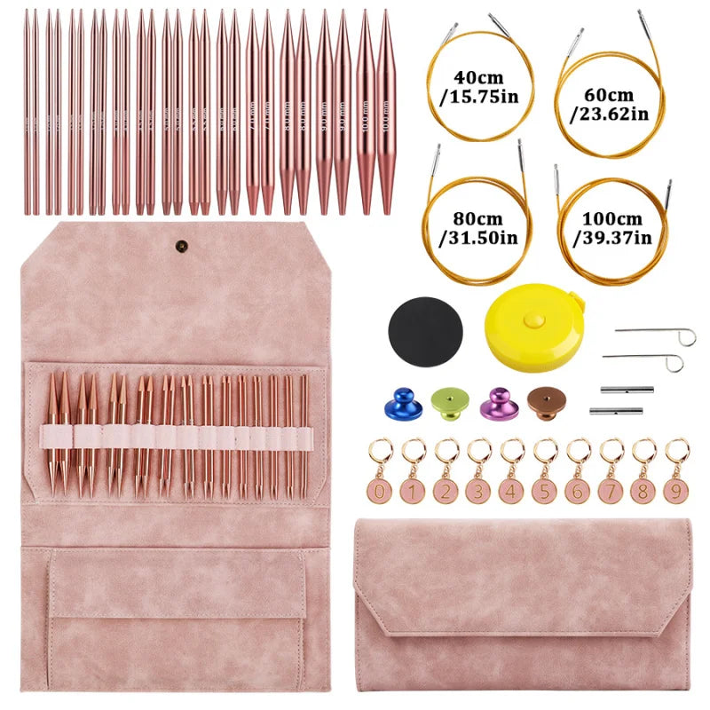 A pink storage case holds various sizes of aluminum circular needles and a set of jewelry findings.