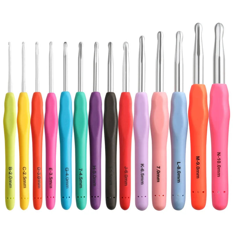 A set of precision aluminum crochet hooks in various colors and sizes arranged in a row.