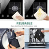 Reusable silicone stove protectors used to prevent scratches on a gas stove surface.