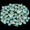 A collection of 50 faceted, light blue-green silver claw rhinestones arranged in a circular pattern.