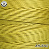 A spool of bright yellow waxed thread embroidery cord is shown in a close-up view.