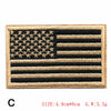 Embroidered American flag patch featuring stars and stripes on a tan background