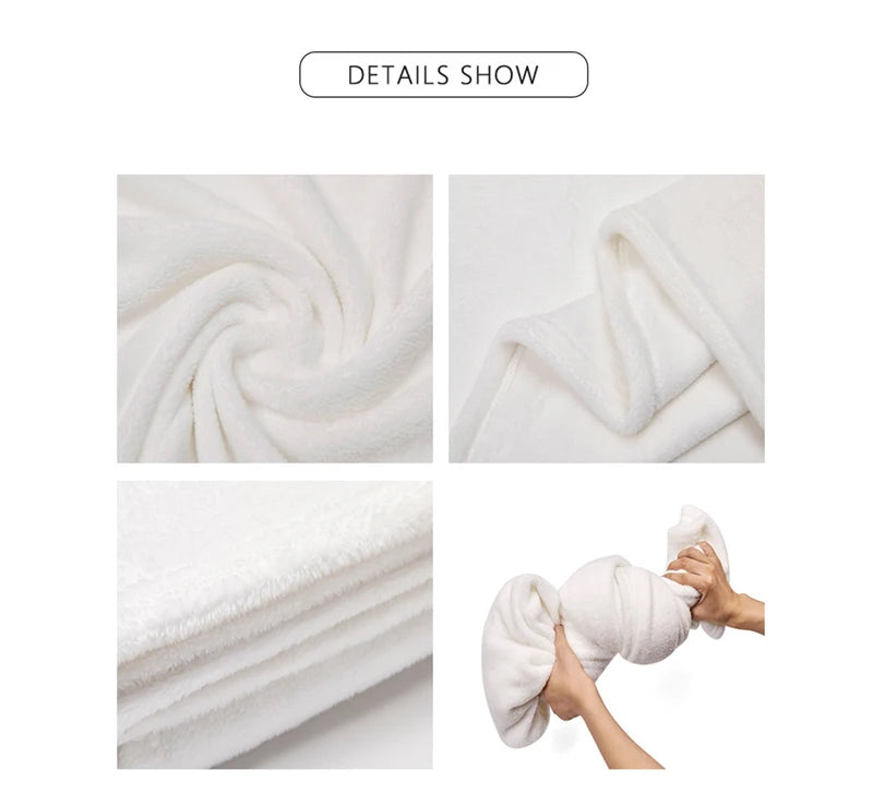 A white flannel throw blanket is shown in various folds and stacked layers.