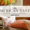 A collection of decorative pillows and framed art featuring warm earth tones and floral patterns.