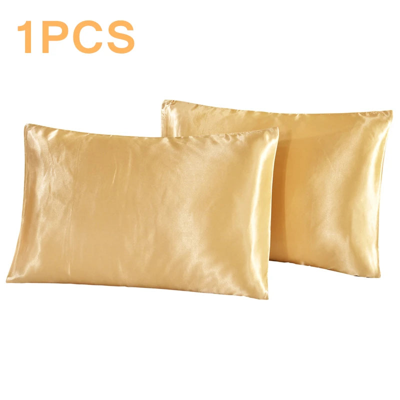 One silky satin pillowcase in a golden yellow color.