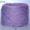 Purple metallic merino wool yarn in a ball, ready for hand knitting.