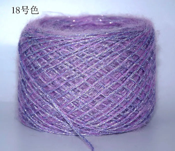Purple metallic merino wool yarn in a ball, ready for hand knitting.