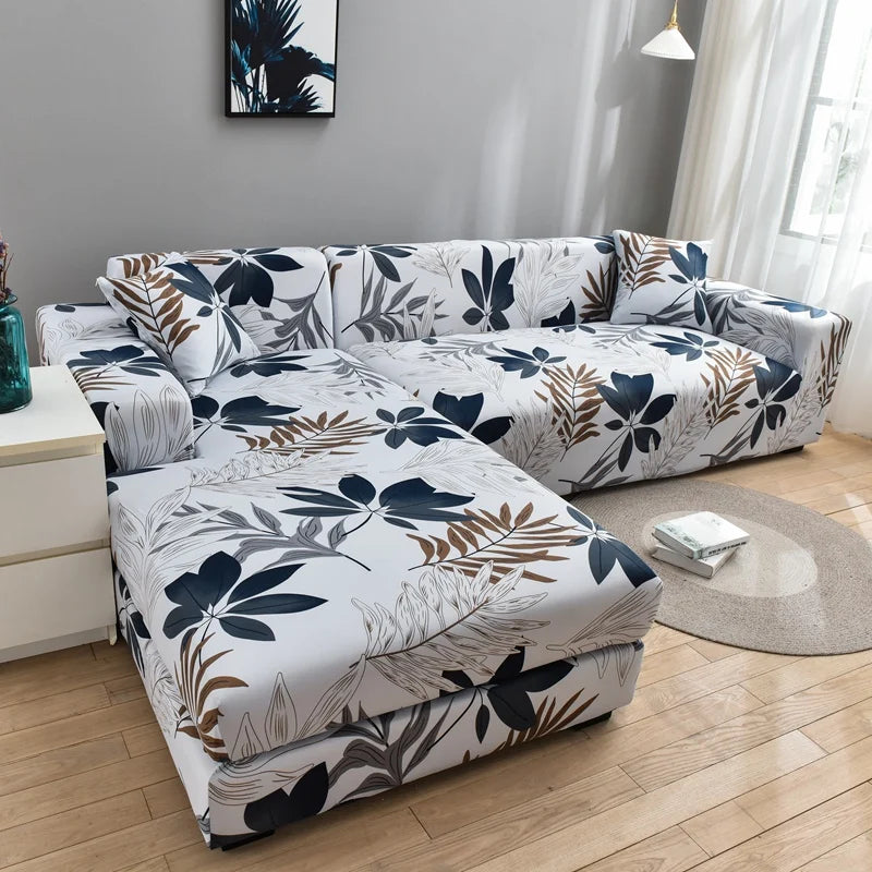 A stylish printed sofa protector cover featuring dark blue and brown botanical patterns on a white fabric.