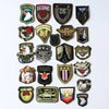 A collection of embroidered iron-on patches representing various US military and service organizations.