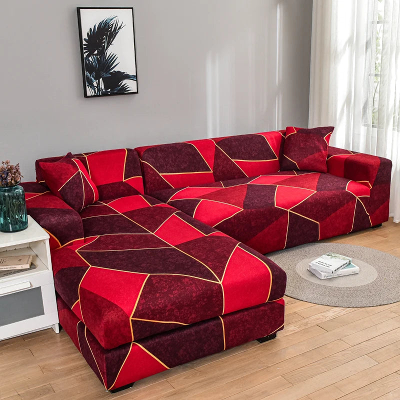 A deep red and maroon L-shaped sofa protector cover featuring a geometric pattern in a modern living room.