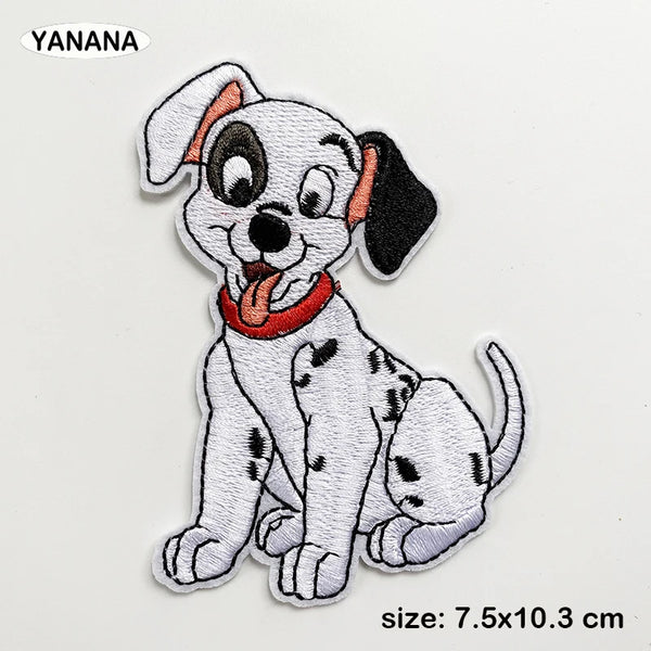 An embroidered patch of a small white dog with black spots and floppy ears.
