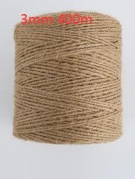 A spool of natural hemp jute rope, approximately 400 meters long, used for home decor and crafting.