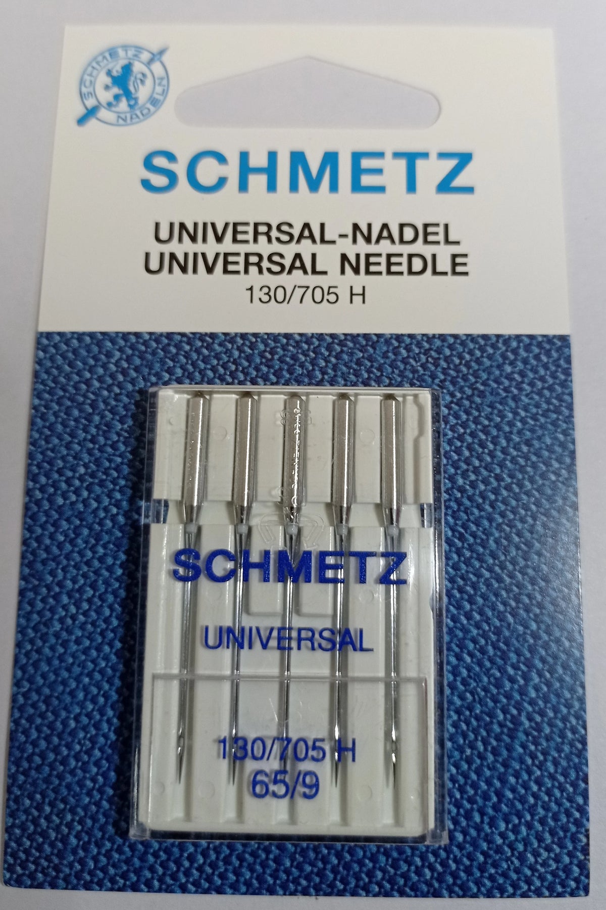 A package of Schmidt universal needle sewing machine needles labeled 130/705 H 65/9.