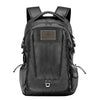 Black backpack with an embroidered American flag patch on the front pocket.
