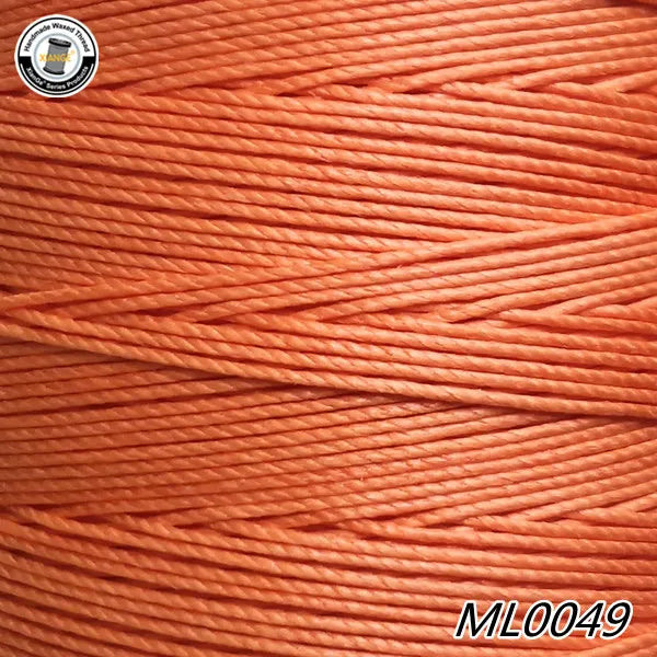 A close-up view of orange waxed thread embroidery cord labeled ML0049.