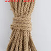 A bundle of natural hemp jute rope in a light tan color, tied into a thick cord.