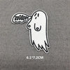 White embroidered patch of a ghost with the word BOODLOOS above its head