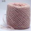 A ball of pink metallic merino wool yarn for hand knitting