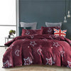 A deep burgundy duvet cover featuring a starry night pattern with silver and white accents.
