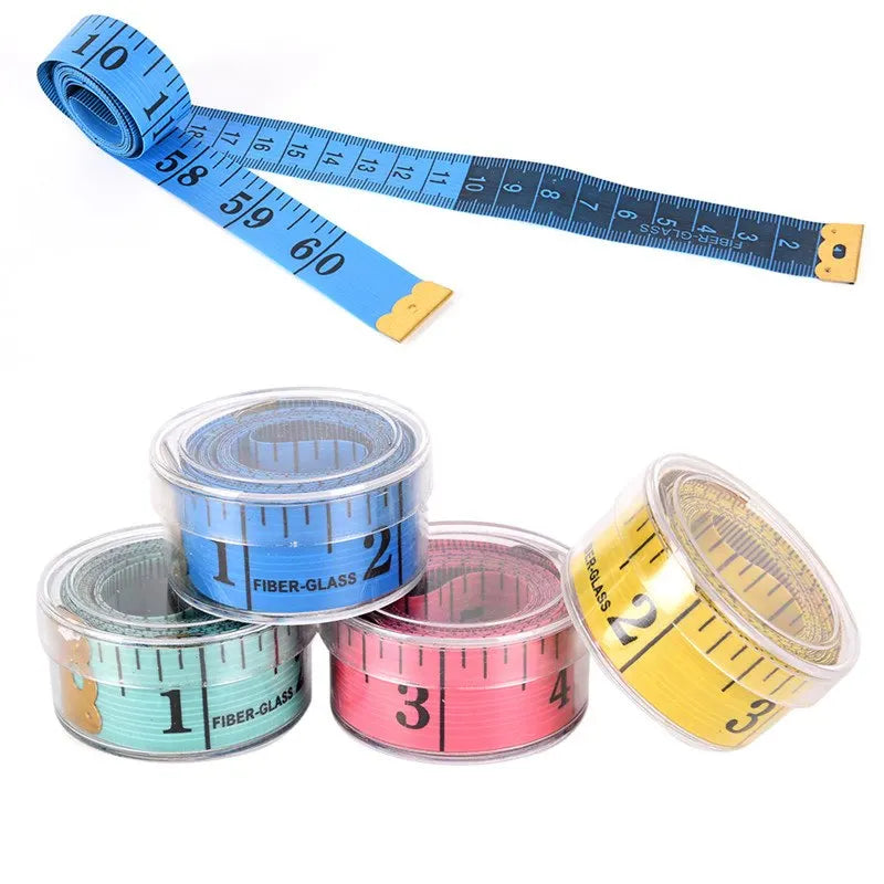A set of flexible body measuring tape rulers in various colors and sizes, including blue, yellow, and pink.
