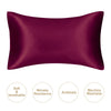 A smooth, deep plum satin pillowcase shown flat, highlighting its luxurious texture and finish.