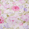 Pink floral and stripe cotton twill fabric with pink, purple, and green flowers