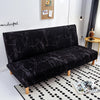 Black geometric print spandex slipcovers on a sofa bed.