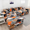 L-shaped sofa protector covers featuring a geometric pattern of black, orange, gray, and brown fabric.