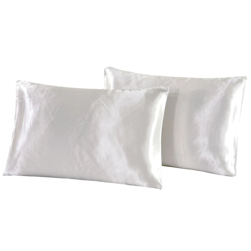 Two white silky satin pillowcases shown side by side.