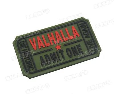 A dark olive green embroidered Viking patch with the text VALHALLA ADMIT ONE stitched in red thread.